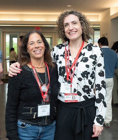 Susan Panullo and Tamatha Fenster stand together at event